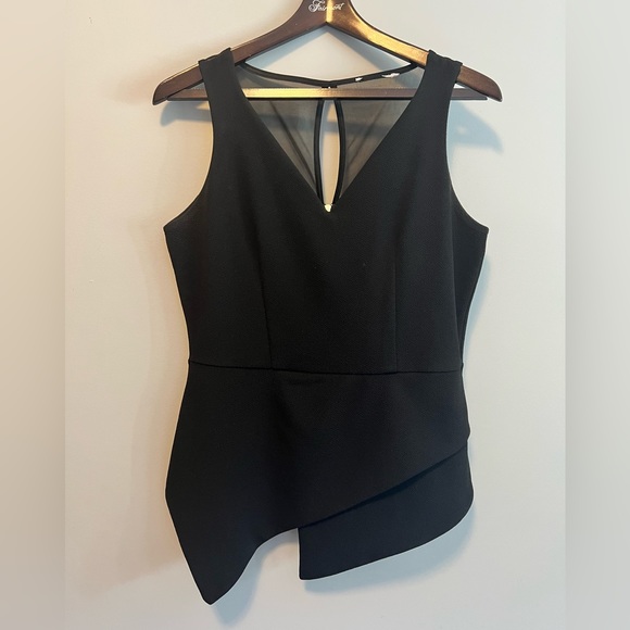 Asymmetrical black top. Mesh shoulder and upper back. - Picture 1 of 2